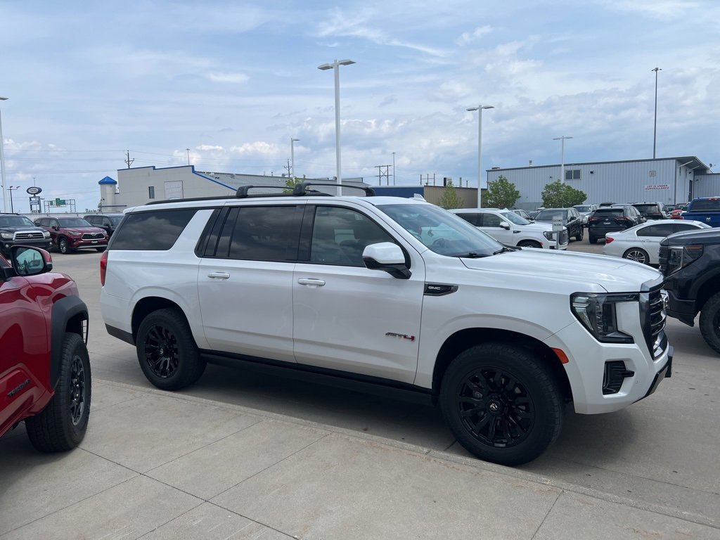 Used 2021 GMC Yukon XL AT4 with VIN 1GKS2HKD9MR195765 for sale in Fargo, ND