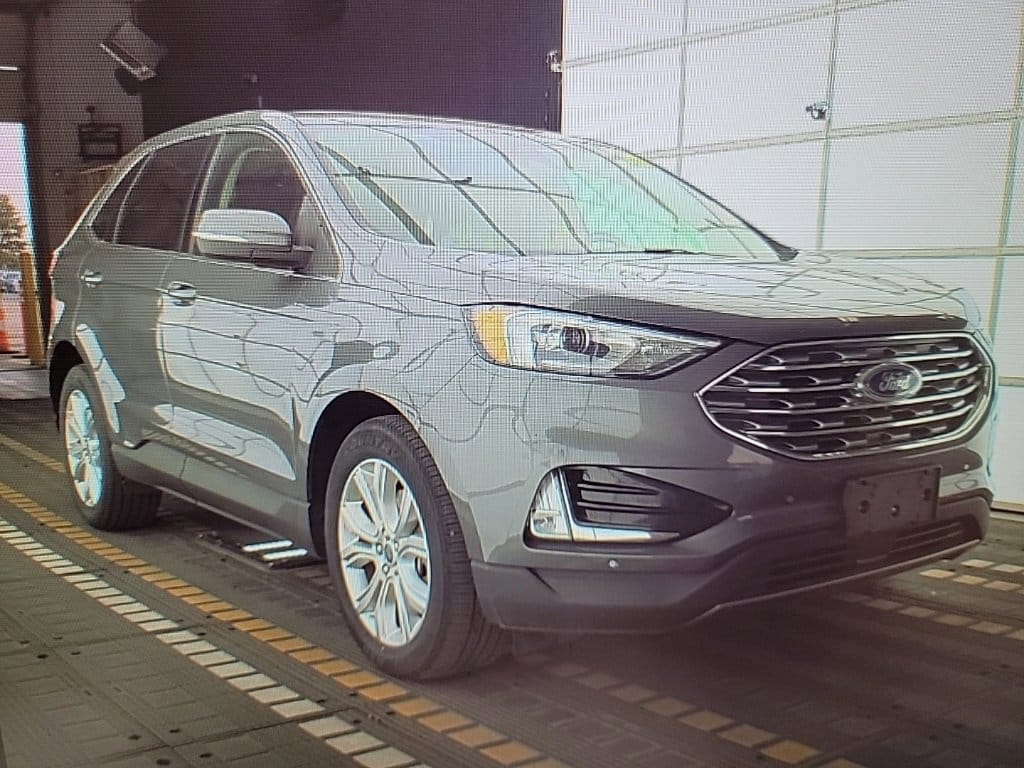 Used 2021 Ford Edge Titanium with VIN 2FMPK4K98MBA21335 for sale in Fargo, ND