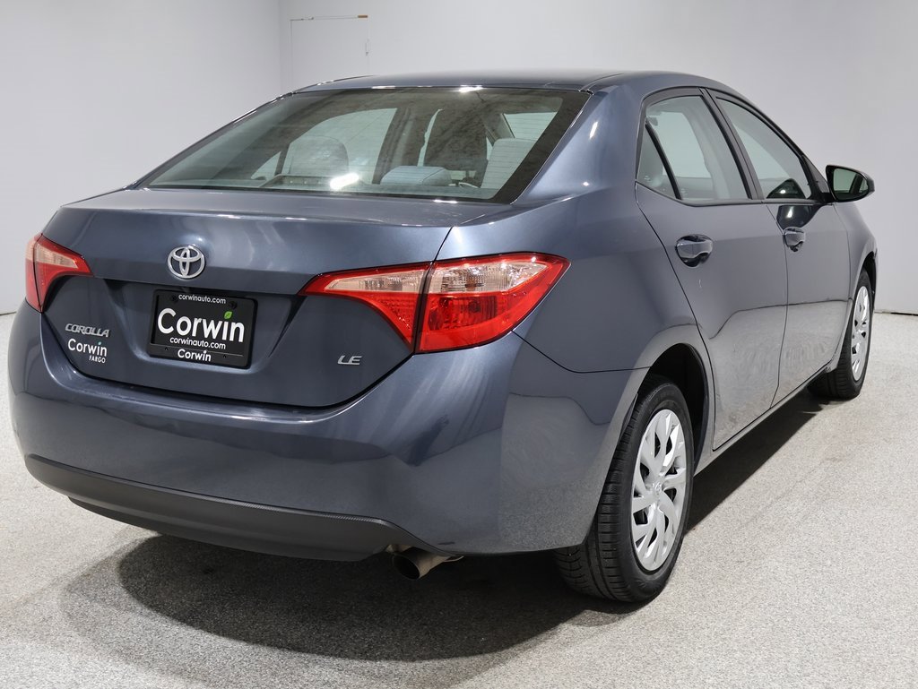 Used 2018 Toyota Corolla LE with VIN 5YFBURHE3JP784344 for sale in Fargo, ND