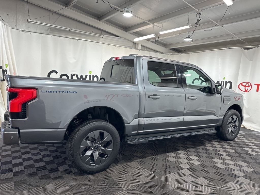 Used 2022 Ford F-150 Lightning Lariat with VIN 1FTVW1EL7NWG15503 for sale in Boulder, CO