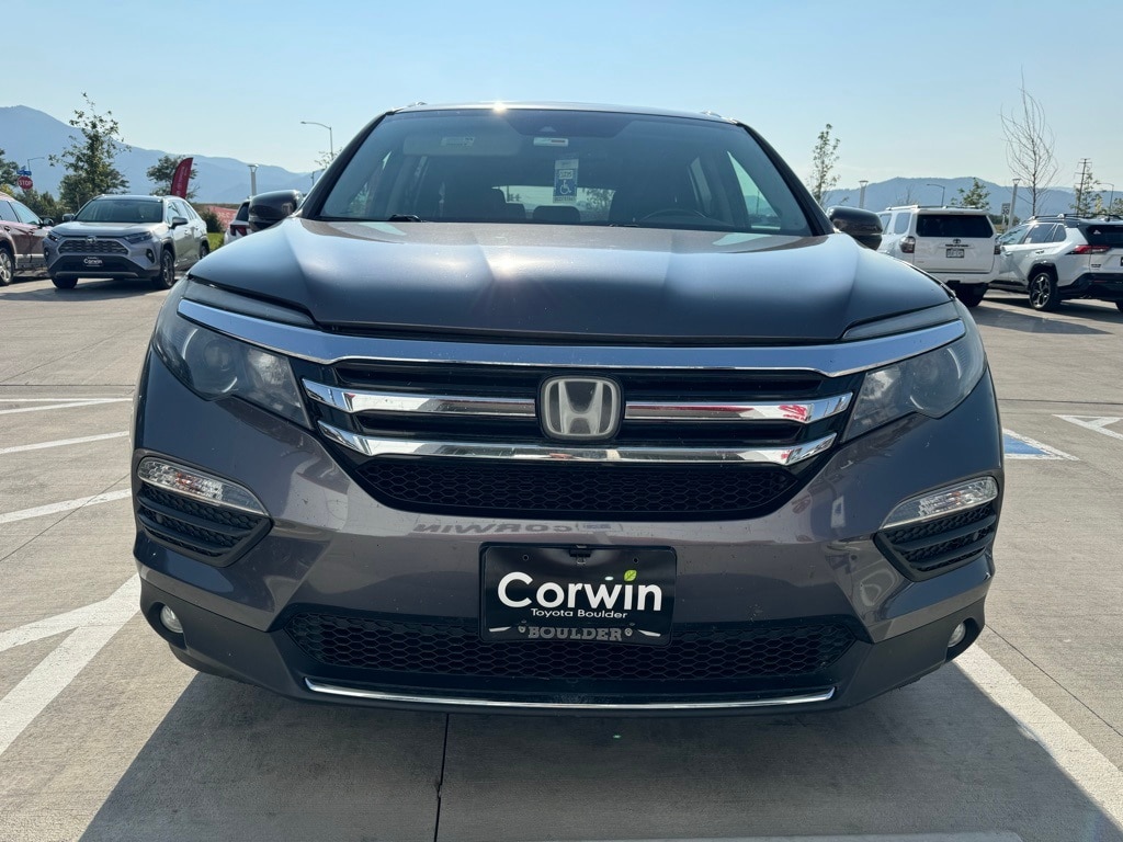 Used 2016 Honda Pilot Touring with VIN 5FNYF6H98GB060322 for sale in Boulder, CO