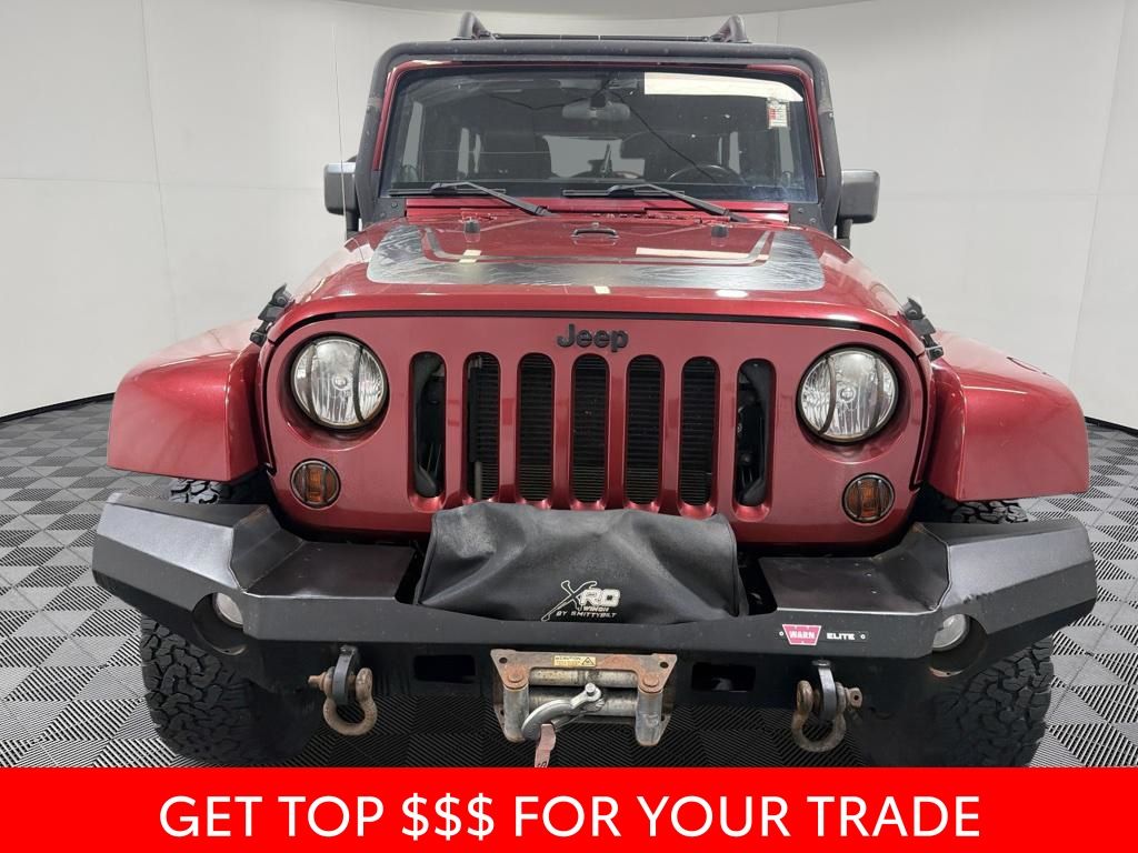 Used 2012 Jeep Wrangler Unlimited Sahara with VIN 1C4BJWEG0CL273540 for sale in Boulder, CO