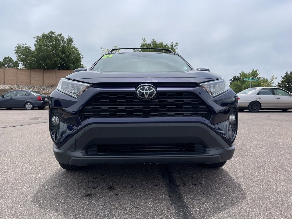 Used 2021 Toyota RAV4 XLE Premium with VIN JTMA1RFV0MD070427 for sale in Colorado Springs, CO