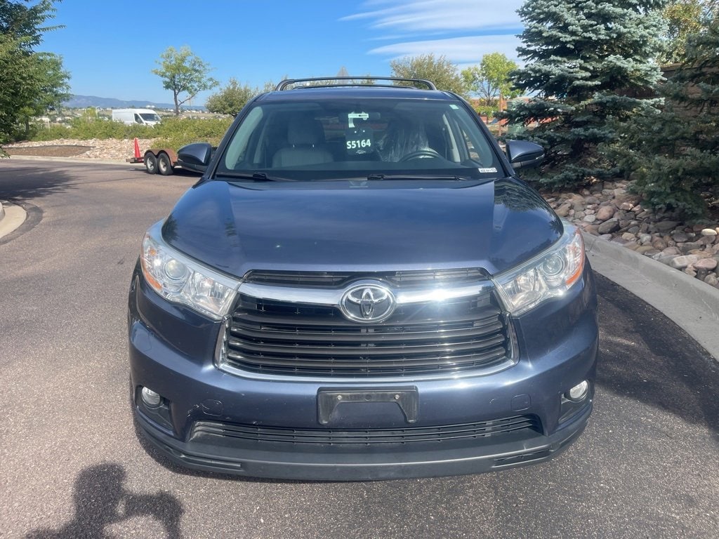 Used 2014 Toyota Highlander LE with VIN 5TDBKRFH8ES028184 for sale in Colorado Springs, CO