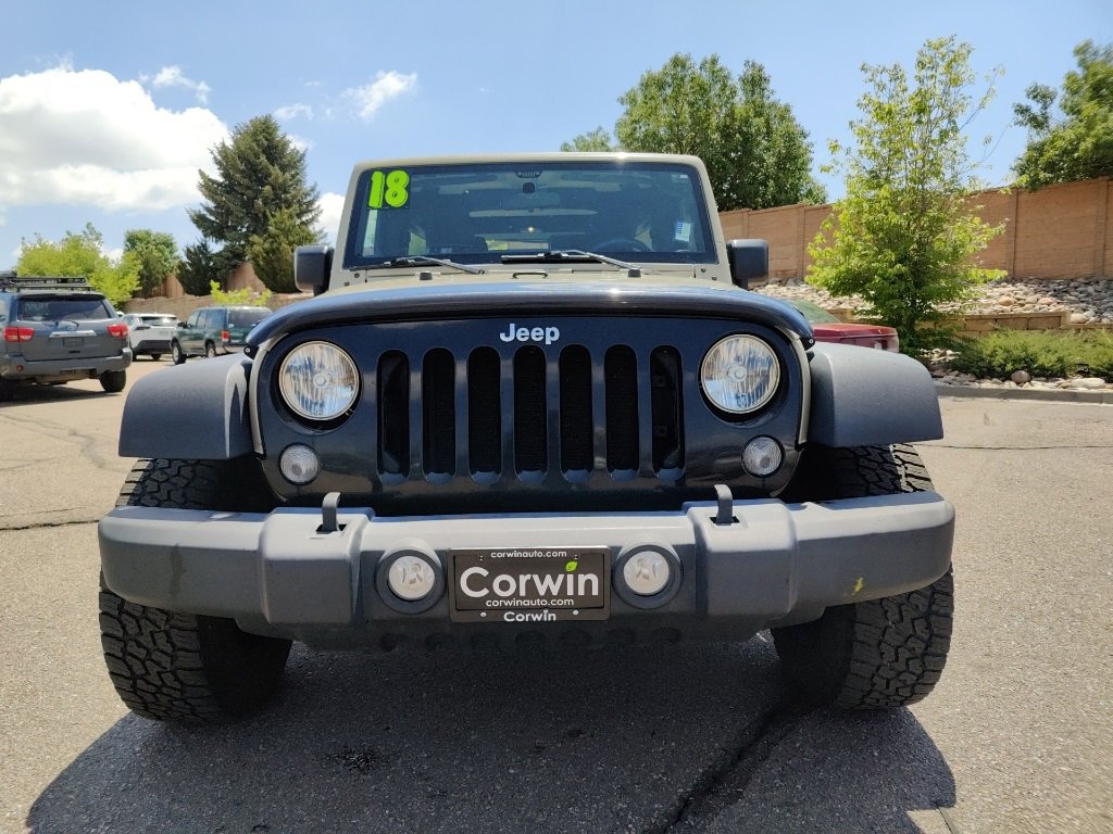 Used 2018 Jeep Wrangler JK Unlimited Sport with VIN 1C4BJWDG6JL819403 for sale in Colorado Springs, CO