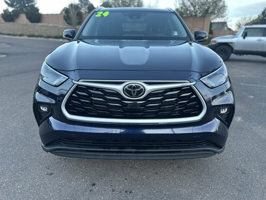 Used 2024 Toyota Highlander XLE with VIN 5TDKDRBH7RS533770 for sale in Colorado Springs, CO