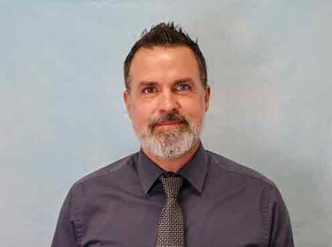 Staff member JUSTIN MITCHELL from a0a780cbdf95