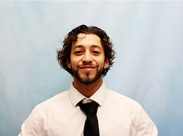 Staff member CHRISTIAN LIKINS from 5464b65eac88