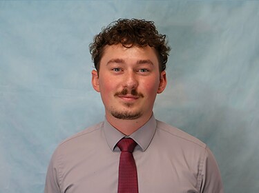 Staff member NICK LENZEN from adf327ae9b1a