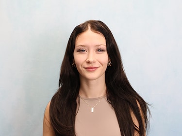 Staff member BAILEE DOWNING from 5464b65eac88