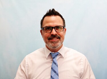 Staff member JUSTIN MITCHELL from 65076f7edf06