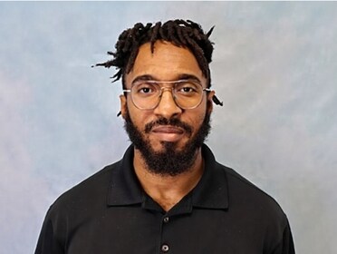 Staff member Stanley Tisdell from 65076f7edf06