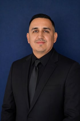 Staff member Angel Corrales from 79189105d9c2