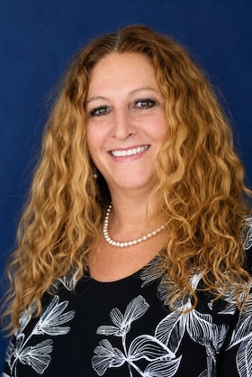 Staff member Vida Wilson from 10c37856bdf1