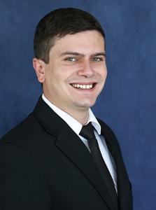 Staff member Cody Holliday from d69273151296
