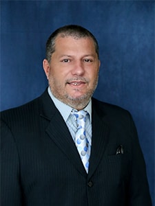 Staff member Joseph Augusta from d69273151296