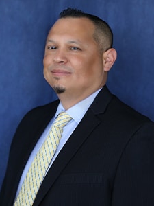 Staff member Chris Sanchez from 220c682f6d97