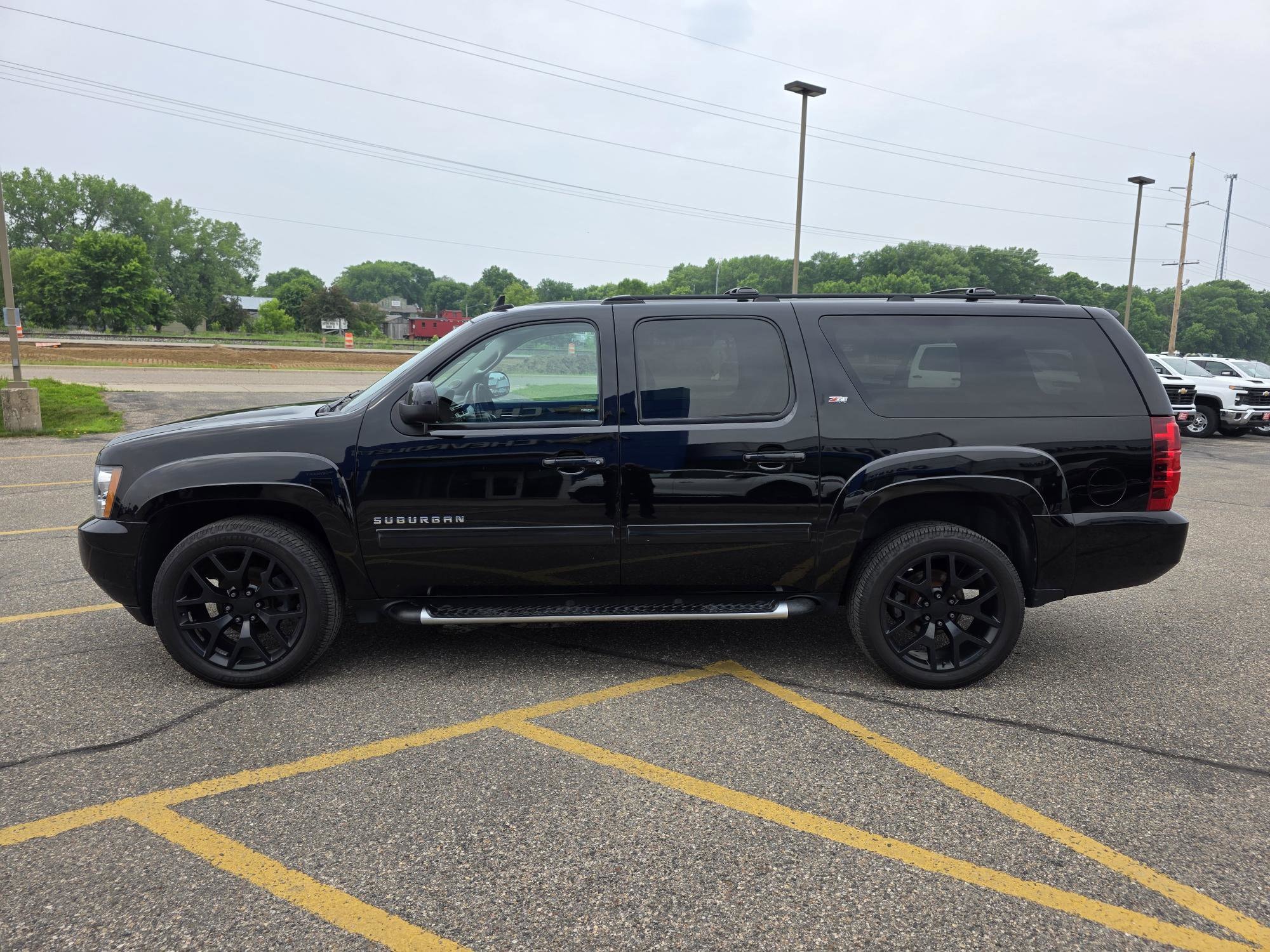 Used 2013 Chevrolet Suburban LT with VIN 1GNSKJE70DR318305 for sale in Annandale, Minnesota