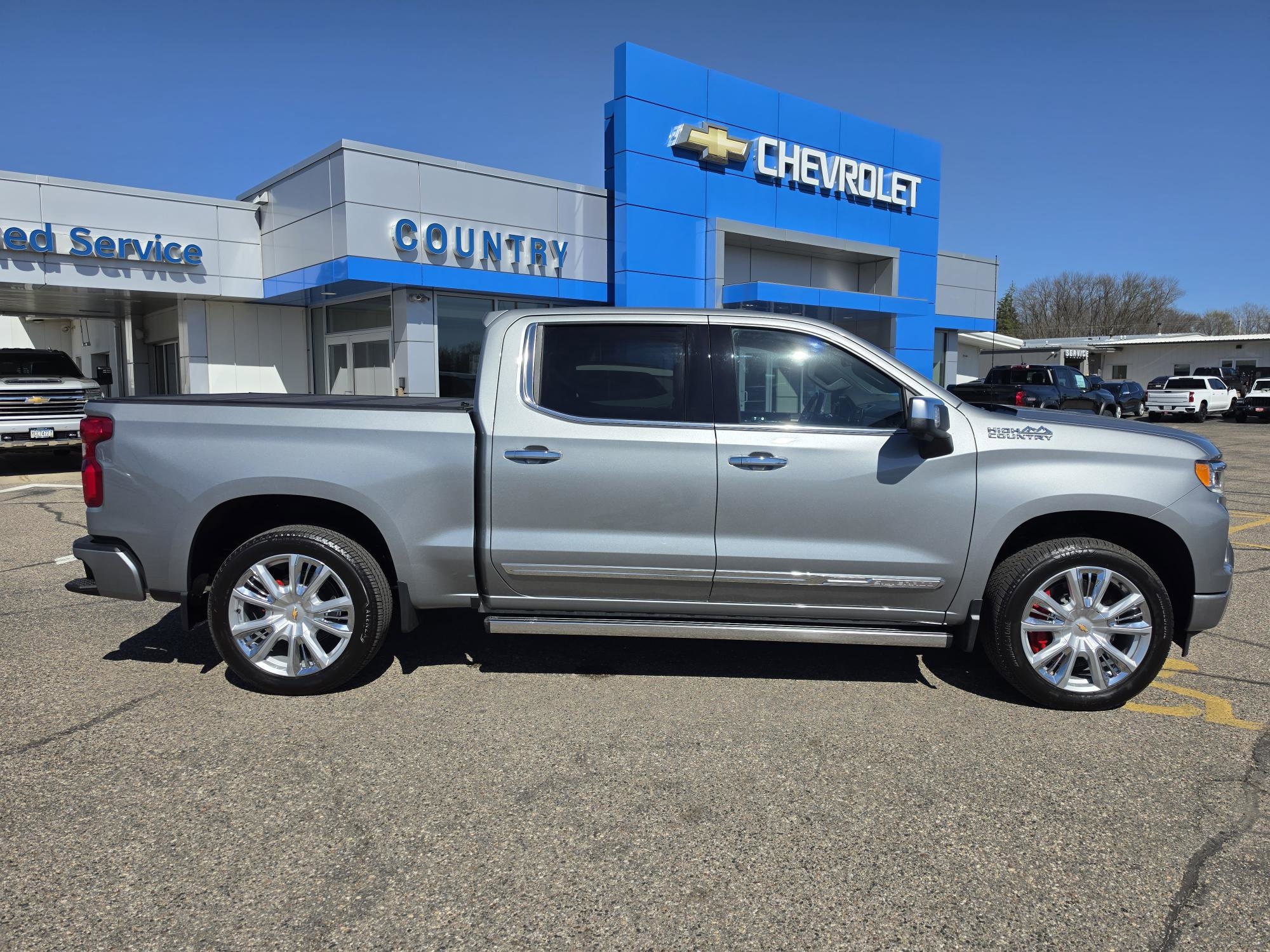 Used 2024 Chevrolet Silverado 1500 High Country with VIN 1GCUDJEL4RZ285521 for sale in Annandale, Minnesota