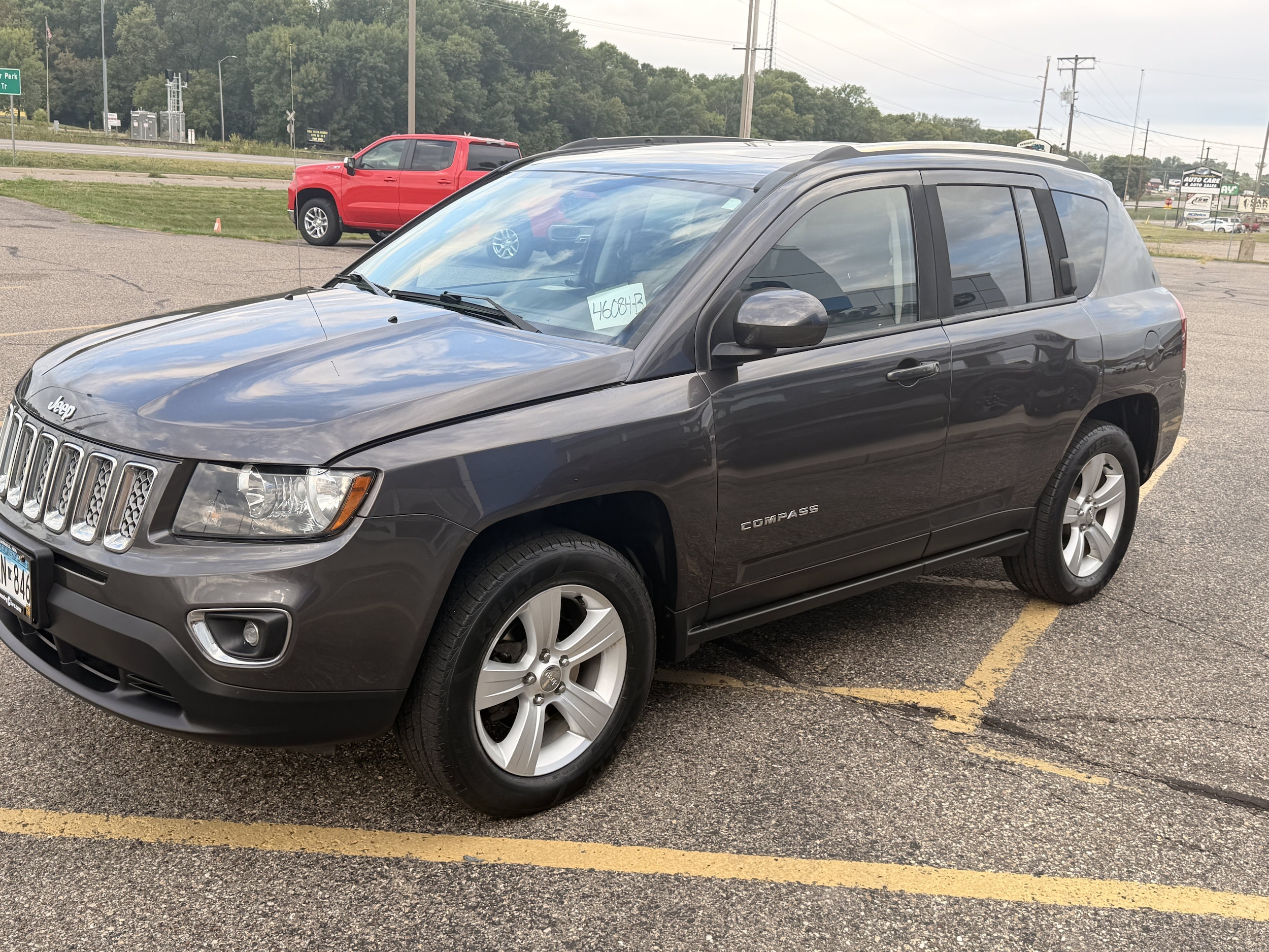 Used 2015 Jeep Compass High Altitude with VIN 1C4NJDAB7FD354111 for sale in Annandale, Minnesota