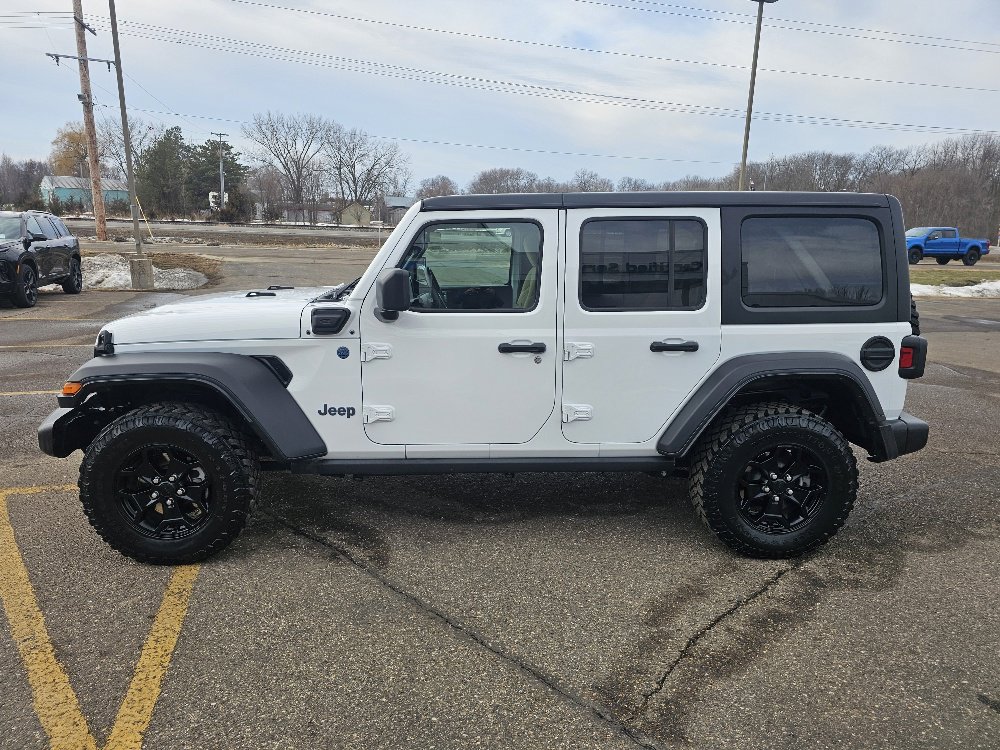 Used 2023 Jeep Wrangler 4xe Willys 4XE with VIN 1C4JJXN65PW605128 for sale in Annandale, Minnesota