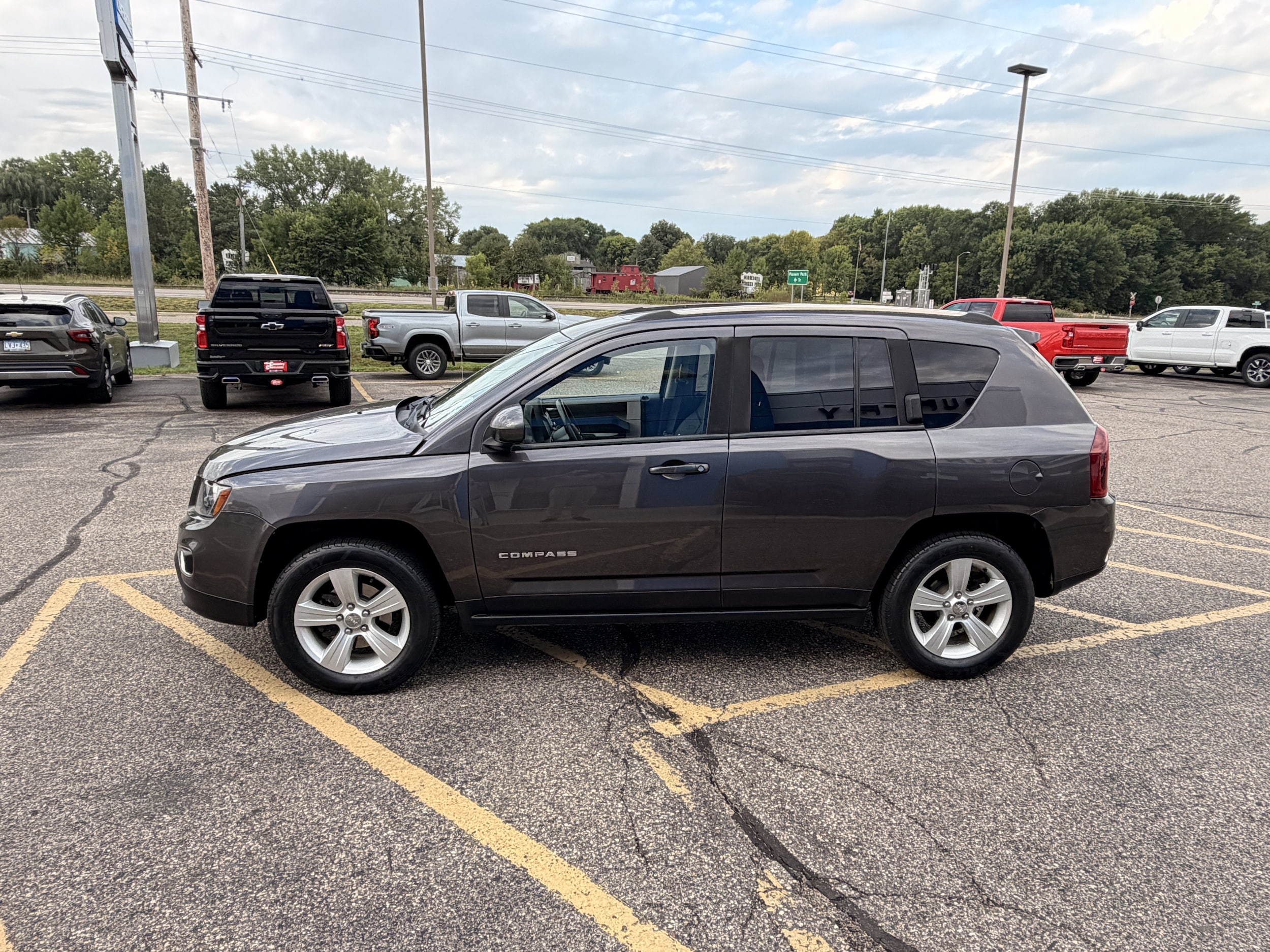 Used 2015 Jeep Compass High Altitude with VIN 1C4NJDAB7FD354111 for sale in Annandale, Minnesota