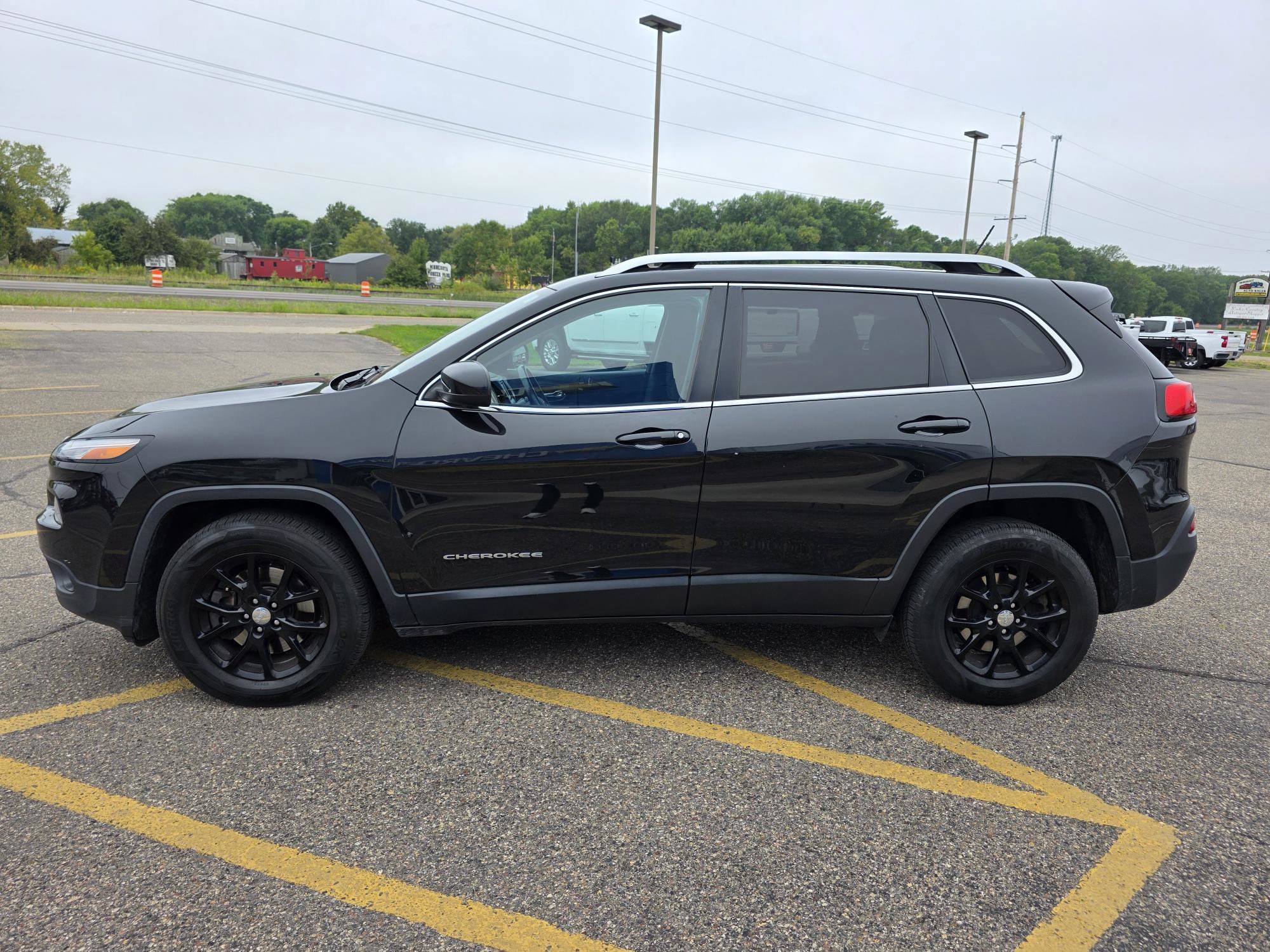 Used 2015 Jeep Cherokee Latitude with VIN 1C4PJMCB3FW764396 for sale in Annandale, Minnesota