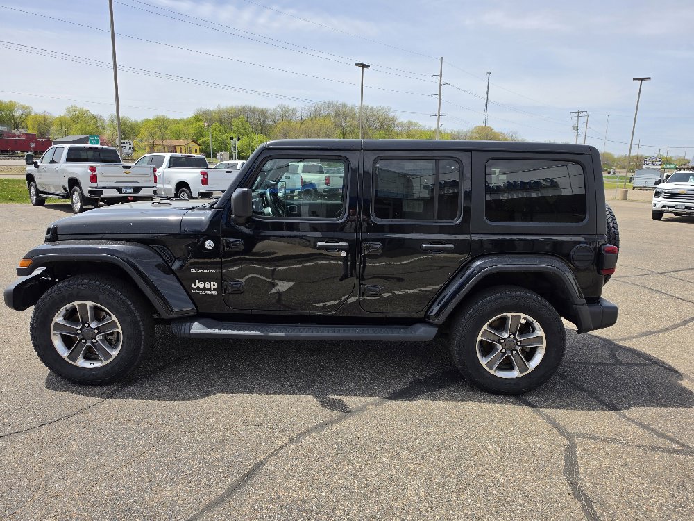 Used 2019 Jeep Wrangler Unlimited Sahara with VIN 1C4HJXEN8KW596097 for sale in Annandale, Minnesota