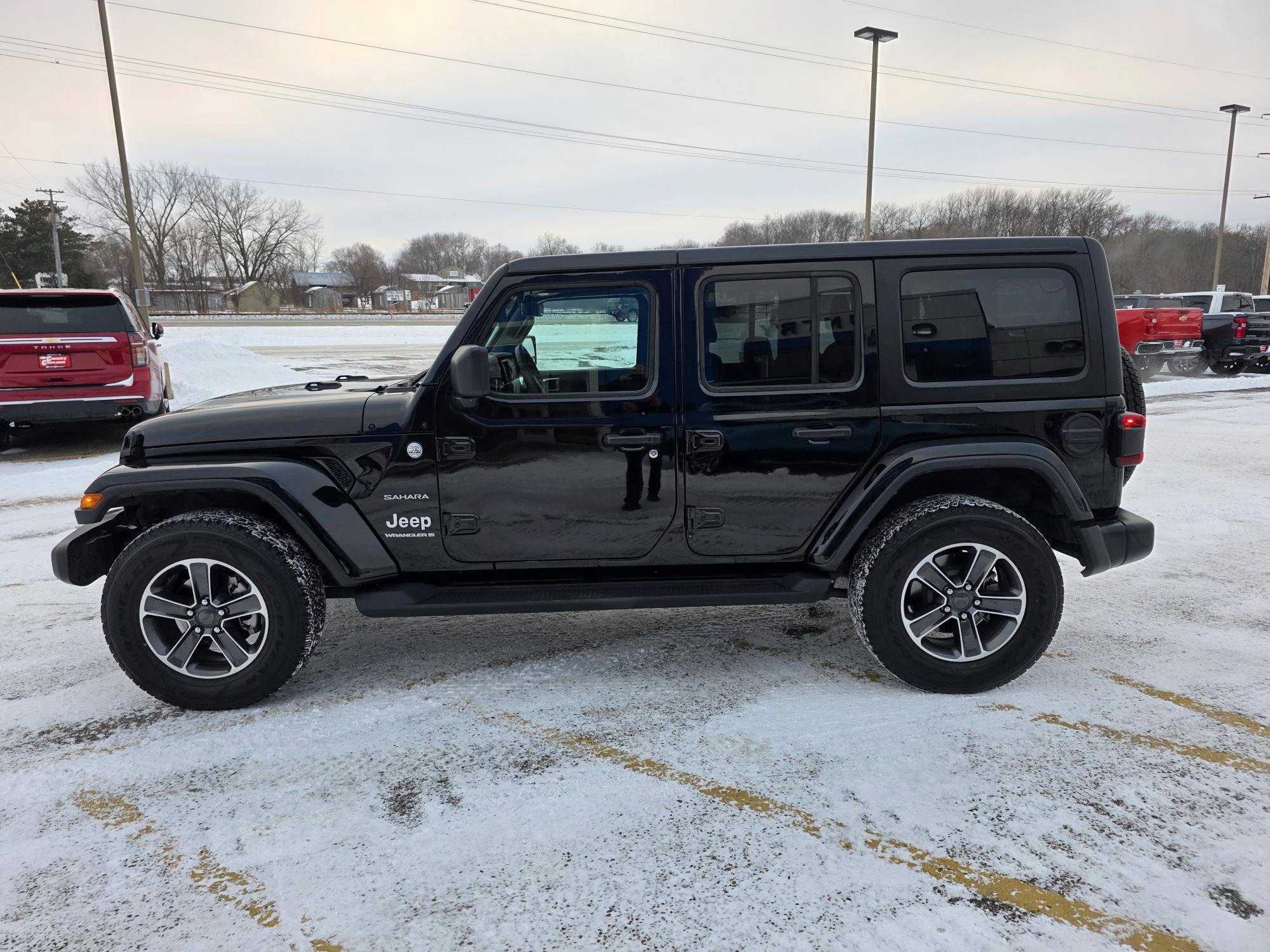 Used 2023 Jeep Wrangler 4-Door Sahara with VIN 1C4HJXEG1PW608065 for sale in Annandale, Minnesota