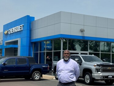 Staff member Sam Lartey-Mingle from ID_a488b62164c3