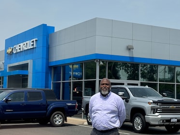 Staff member Sam Lartey-Mingle from ID_a488b62164c3