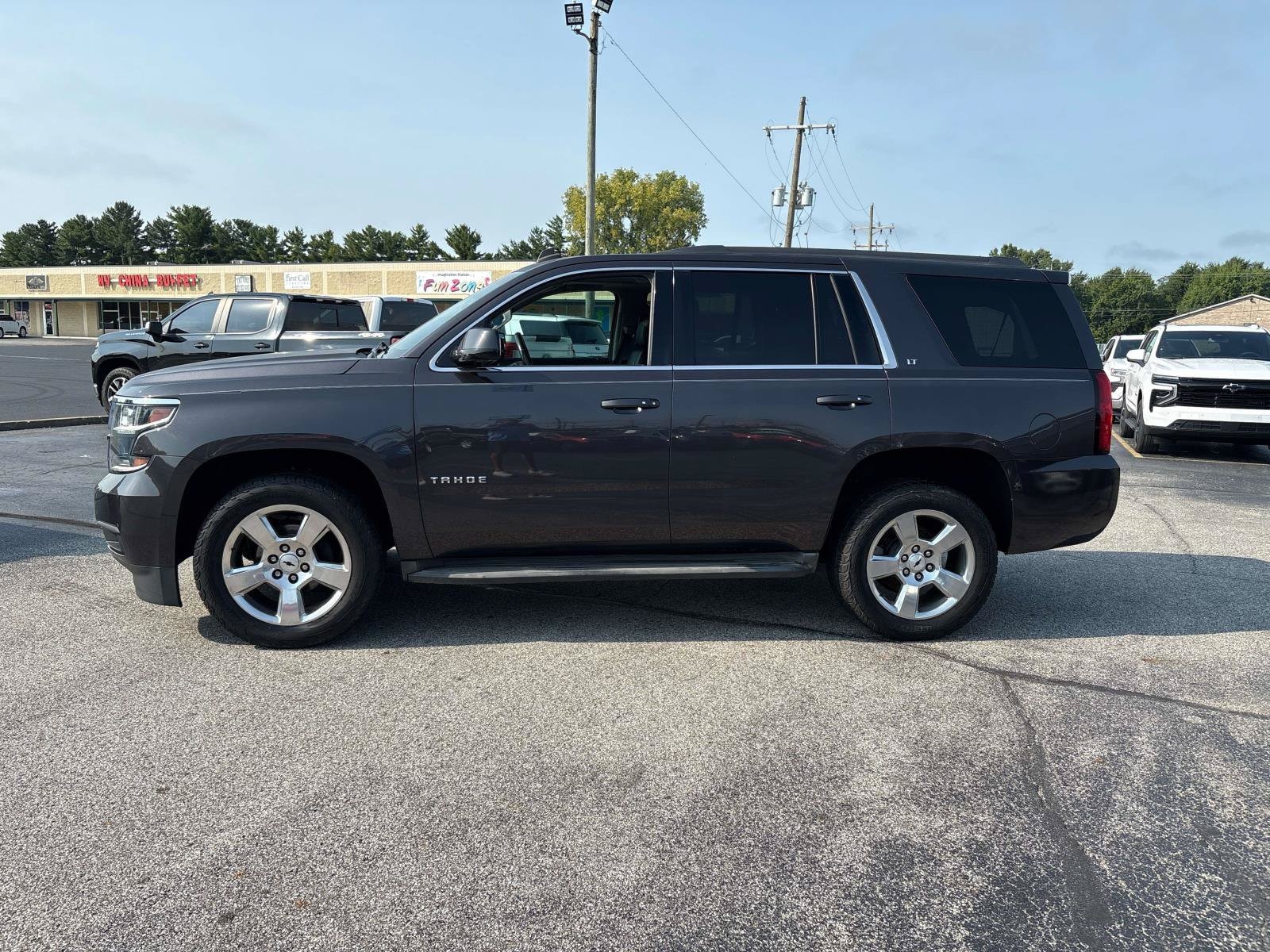 Used 2015 Chevrolet Tahoe LT with VIN 1GNSKBKC7FR119116 for sale in North Vernon, IN