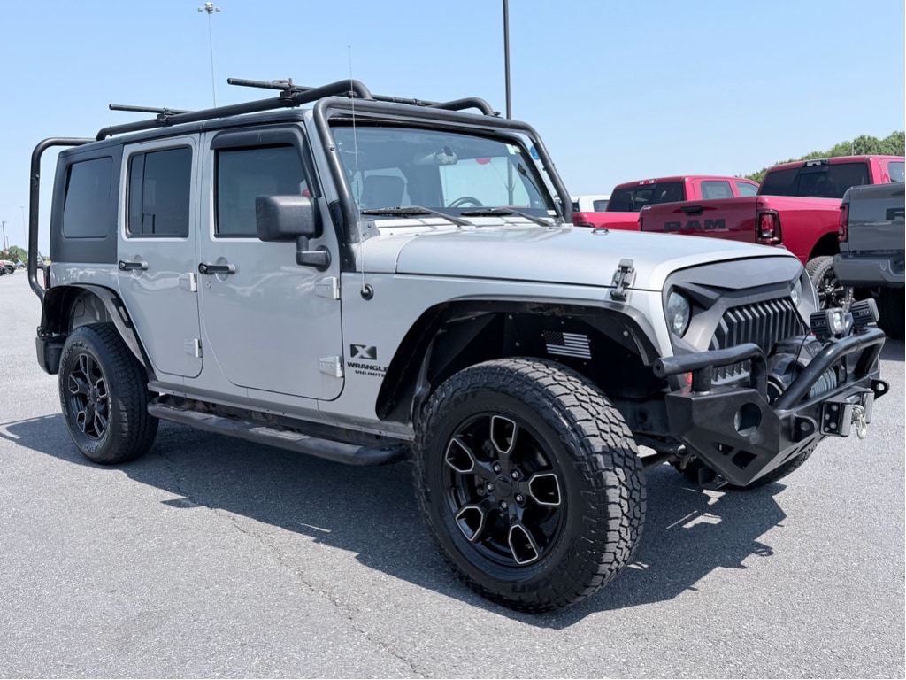 Used 2007 Jeep Wrangler Unlimited X with VIN 1J4GA391X7L117418 for sale in Jackson, GA