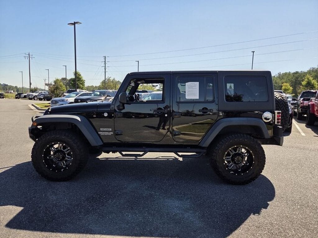 Used 2014 Jeep Wrangler Unlimited Sport with VIN 1C4BJWDG3EL105914 for sale in Jackson, GA