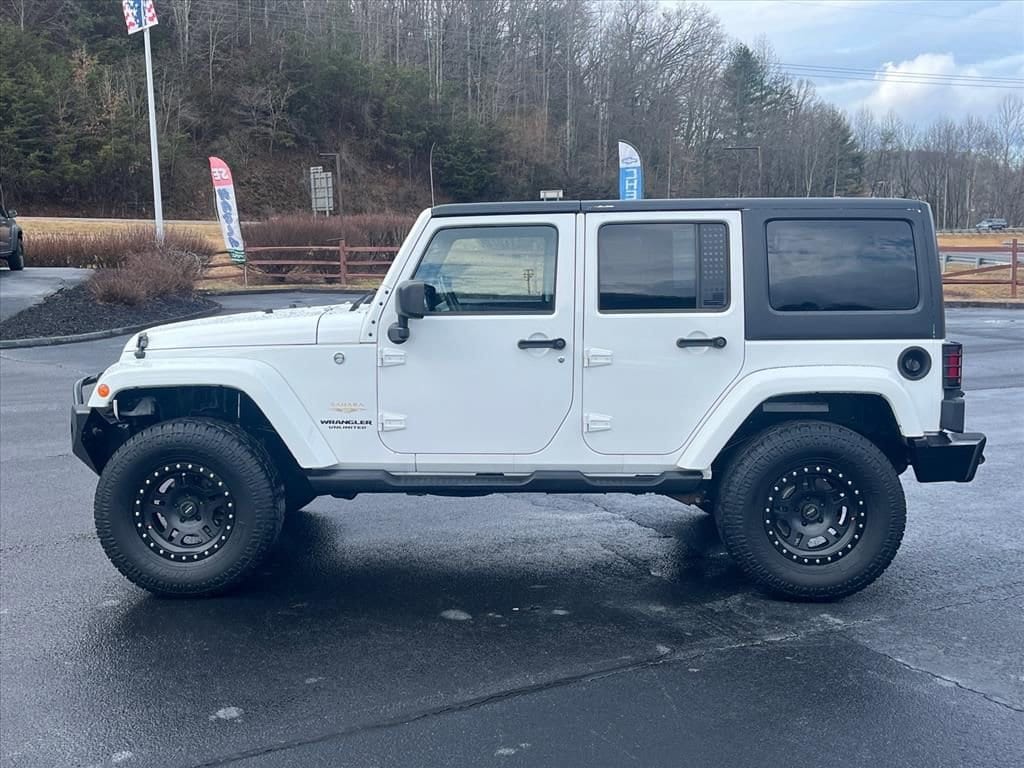 Used 2012 Jeep Wrangler Unlimited Sahara with VIN 1C4BJWEG4CL248107 for sale in Franklin, NC