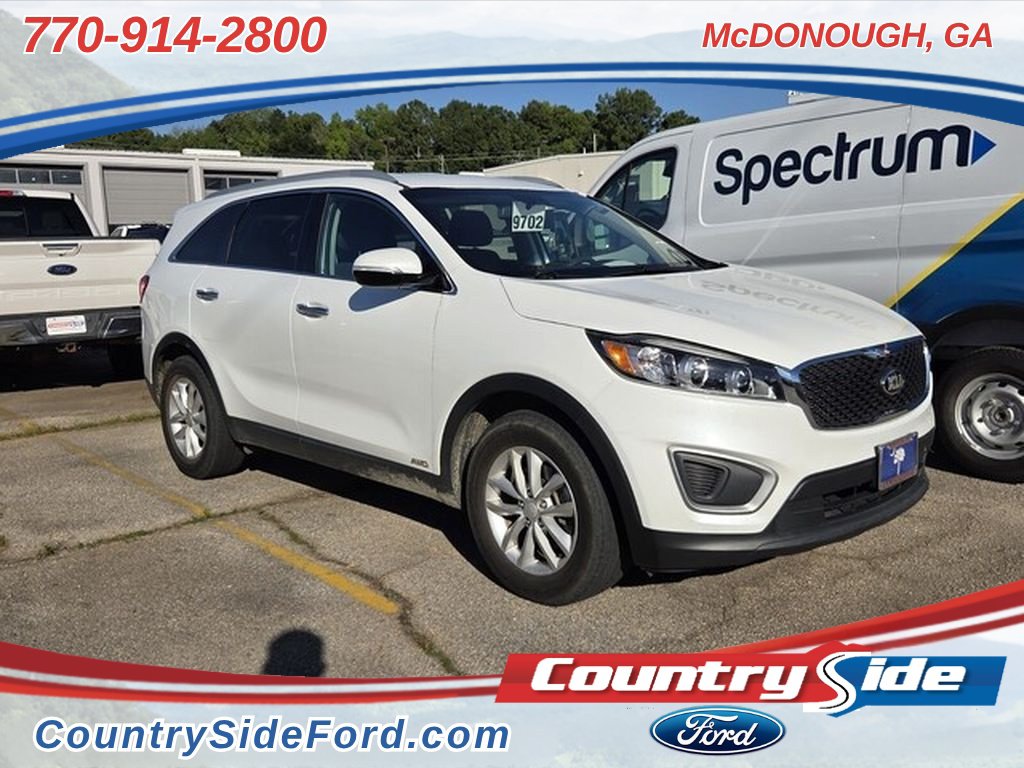 Used 2016 Kia Sorento LX with VIN 5XYPGDA31GG055748 for sale in McDonough, GA
