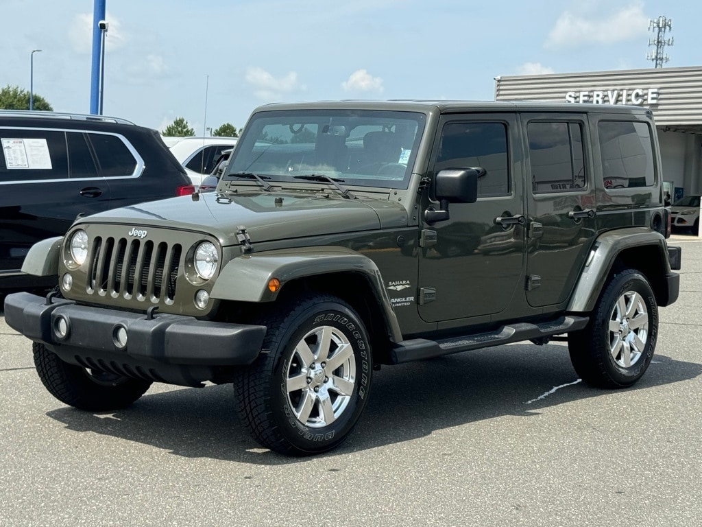 Used 2015 Jeep Wrangler Unlimited Sahara with VIN 1C4HJWEG7FL642585 for sale in Graham, NC