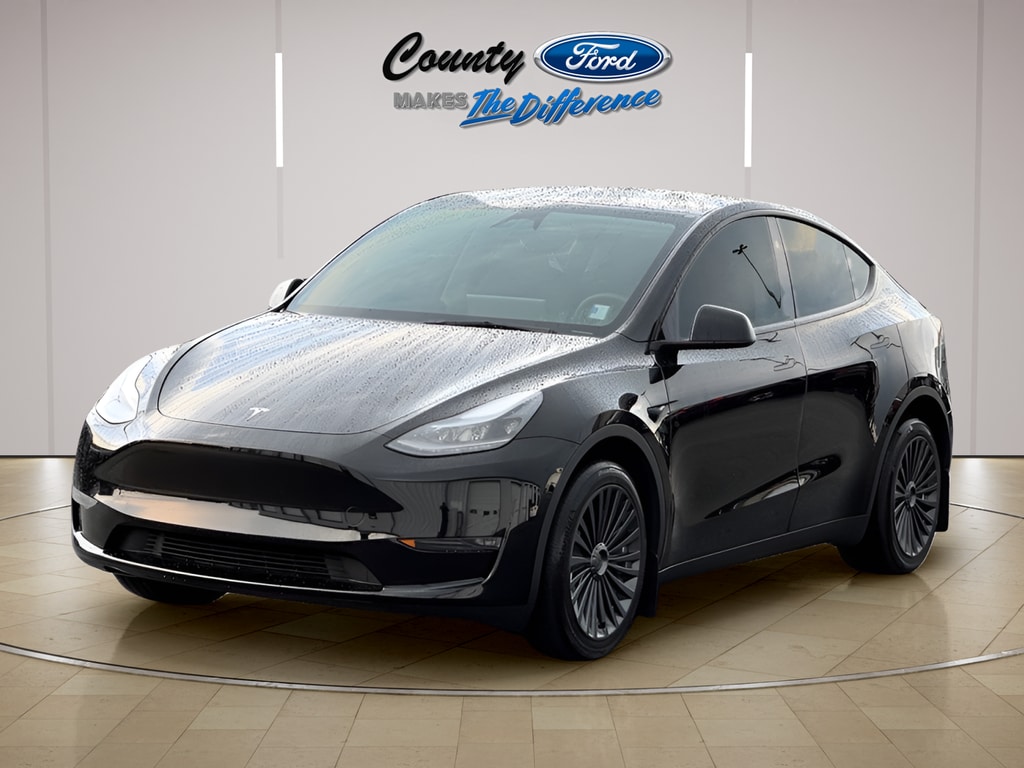 Used 2024 Tesla Model Y Long Range with VIN 7SAYGDEE4RF988833 for sale in Graham, NC
