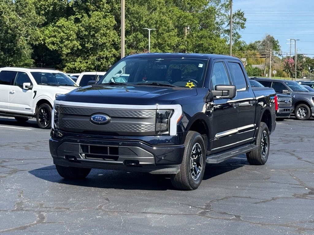 Used 2023 Ford F-150 Lightning XLT with VIN 1FTVW1EL5PWG23375 for sale in Graham, NC