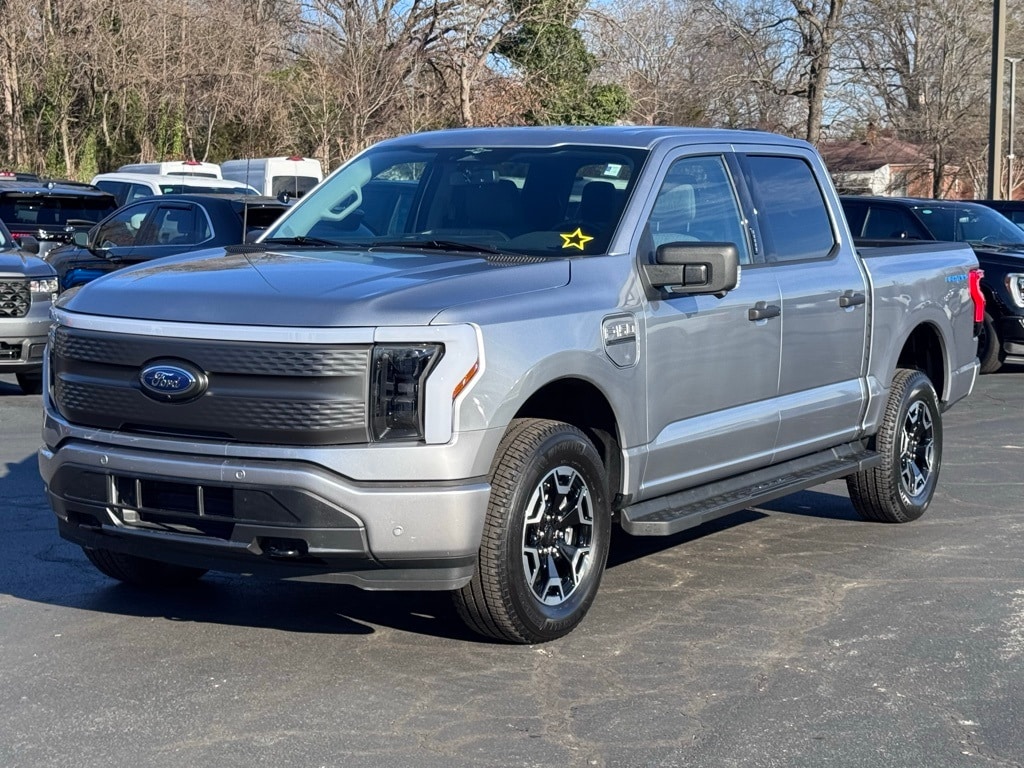 Used 2023 Ford F-150 Lightning XLT with VIN 1FTVW1EL2PWG50579 for sale in Graham, NC