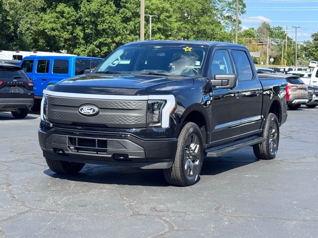 Used 2024 Ford F-150 Lightning XLT with VIN 1FTVW3LK0RWG21283 for sale in Graham, NC