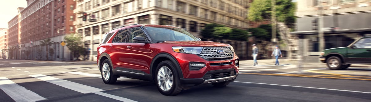 New Ford Explorer driving through the city
