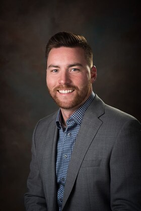 Staff member Ryan Riche from 8957646200ea