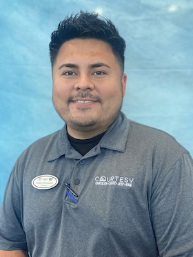 Staff member Miguel Hernandez from ID_206cee436483