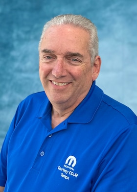 Staff member Andrew Gates from ID_383a4418f0c2