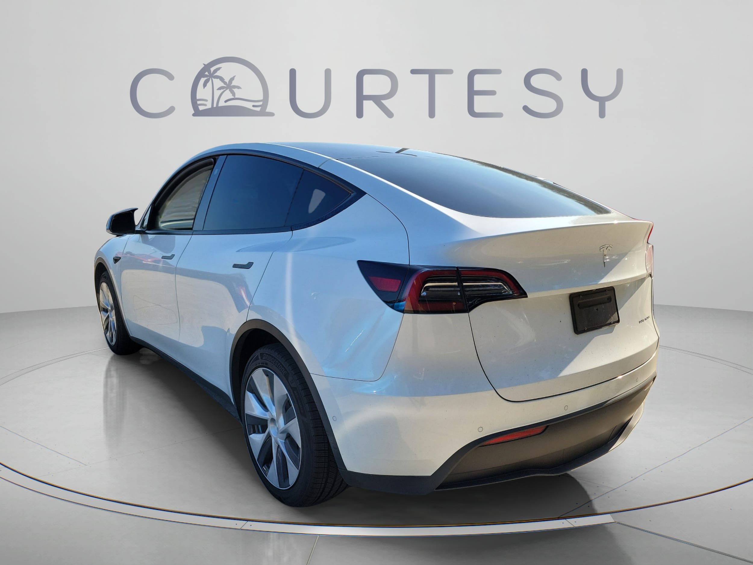 Used 2021 Tesla Model Y Long Range with VIN 5YJYGDEE8MF284303 for sale in Tampa, FL