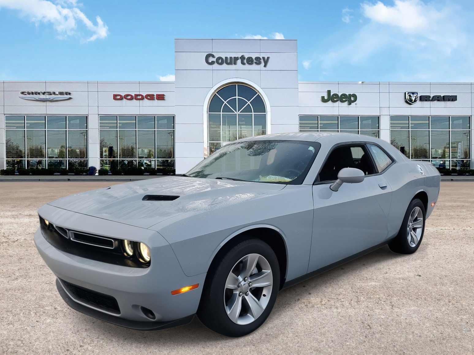 Certified 2021 Dodge Challenger SXT with VIN 2C3CDZAGXMH637663 for sale in Tampa, FL