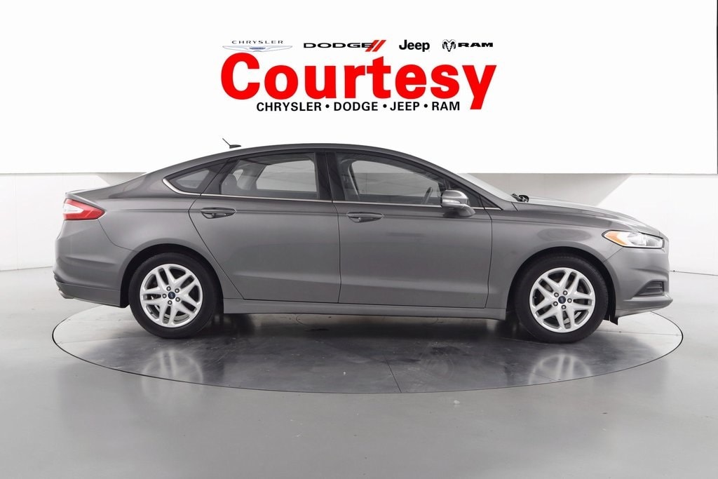Used 2014 Ford Fusion SE with VIN 3FA6P0H77ER354053 for sale in Grand Rapids, MI