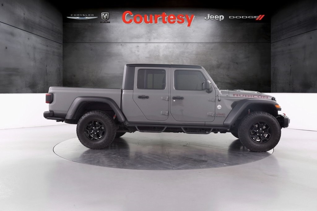 Used 2021 Jeep Gladiator Rubicon with VIN 1C6JJTBG4ML602893 for sale in Grand Rapids, MI