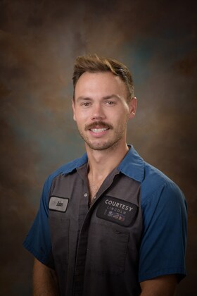 Staff member Adam Tomlin from 01a6564b0d9c